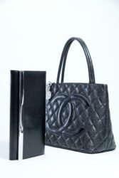 Michael Kors Clutch and Chanel Handbag. Jan. 3, 2013