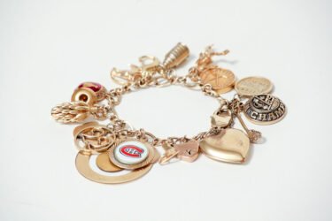 Gold charm braclet. May 16, 2013