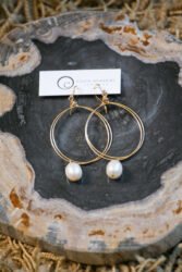 Gold circle earrings with freshwater pearls by Cindy Borders. Dec. 4, 2015